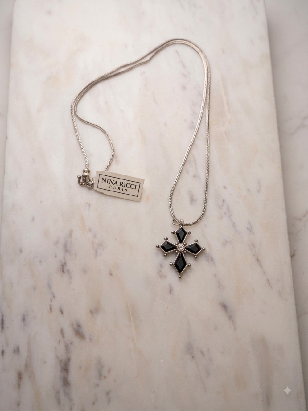 Nina Ricci Black and Silver Cross Pendant Necklace